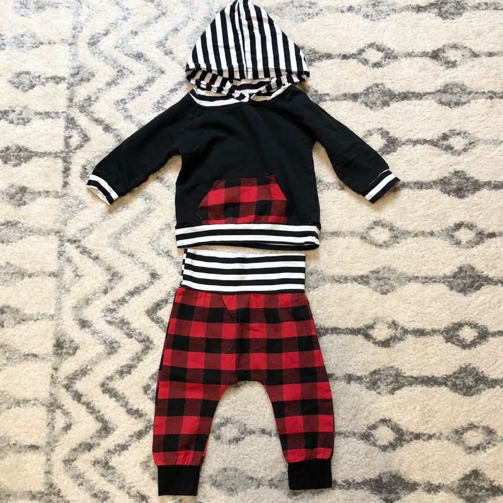 Adorable baby boy matching red plaid outfit